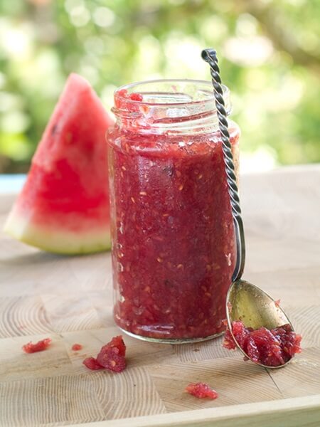 Fruit jam in glass jar, selective focus